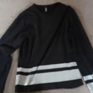 Black long sleeve with holographic design.